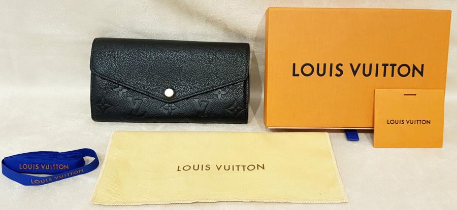 Portefeuille Louis Vuitton en cuir jaune